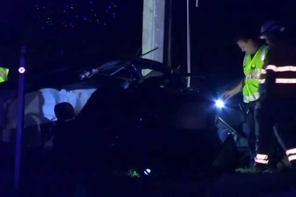 Fatal crash south of Brisbane splits car, leaves driver injured