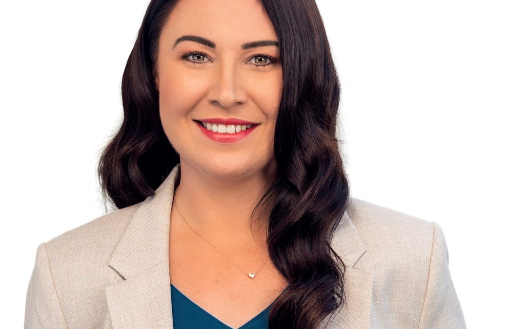 Councillor kicking goals for Logan City sports team