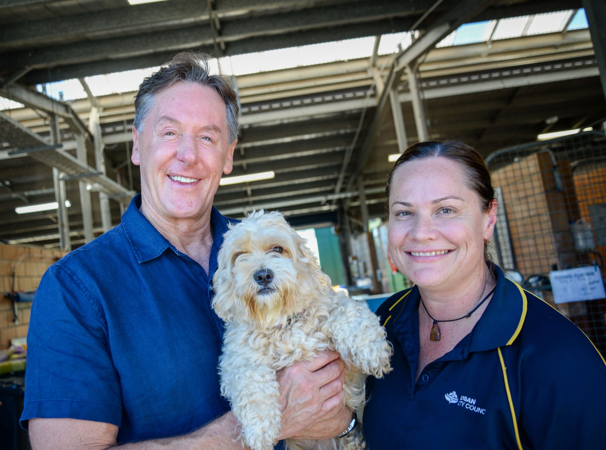 Mayor Darren Power, Triage and Collections Supervisor Donna Lange and Missy the Maltese X