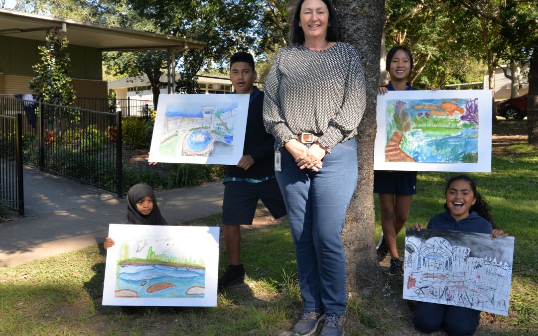 Students from Logan and Japan create artwork of ‘Our Town’ for children’s art exchange project